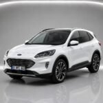 White 2023 Ford Kuga shown from the front three-quarter angle in a studio setting.
