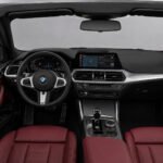 2023 BMW 4.30i Cabrio with red leather seats and modern dashboard
